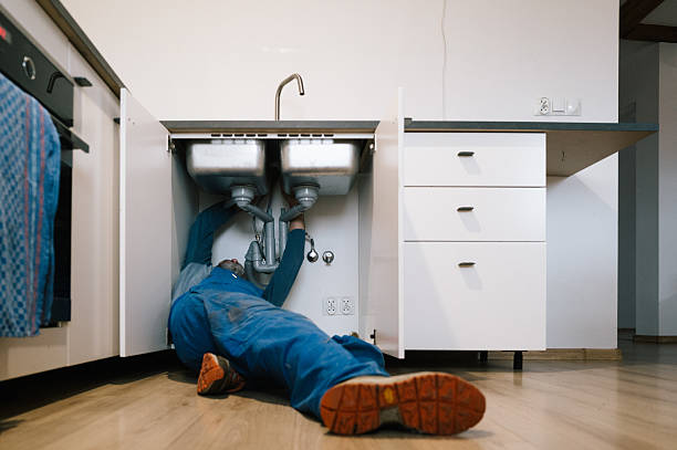 Professional Plumbing technician working in Auxier, KY